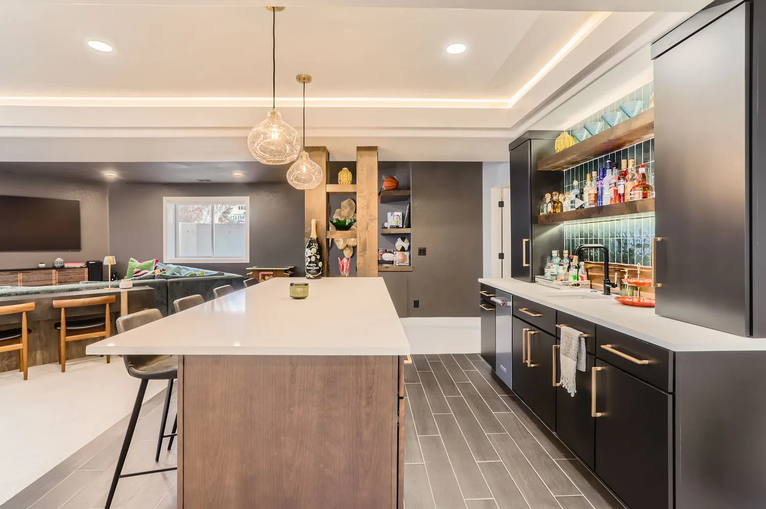 Finished basement bar with custom tile work by DG Home Pro in Erie, Colorado